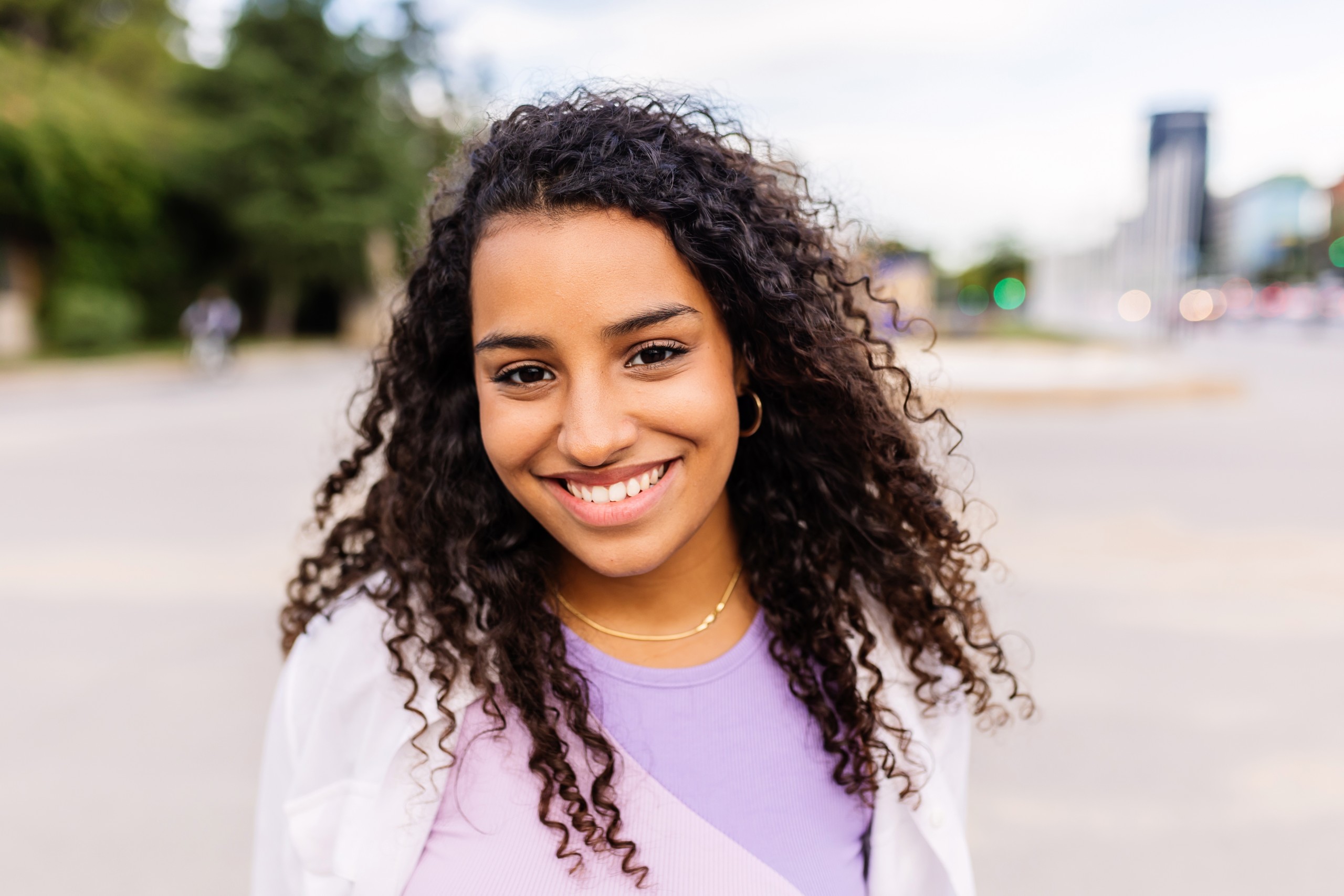 young woman wearing purple